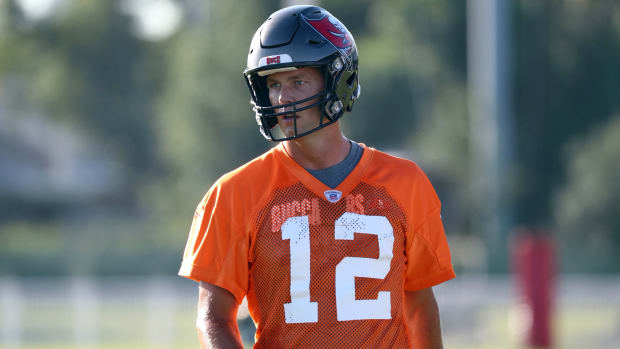 Tampa Bay Buccaneers quarterback Tom Brady (12) works out at AdventHealth Training Center.